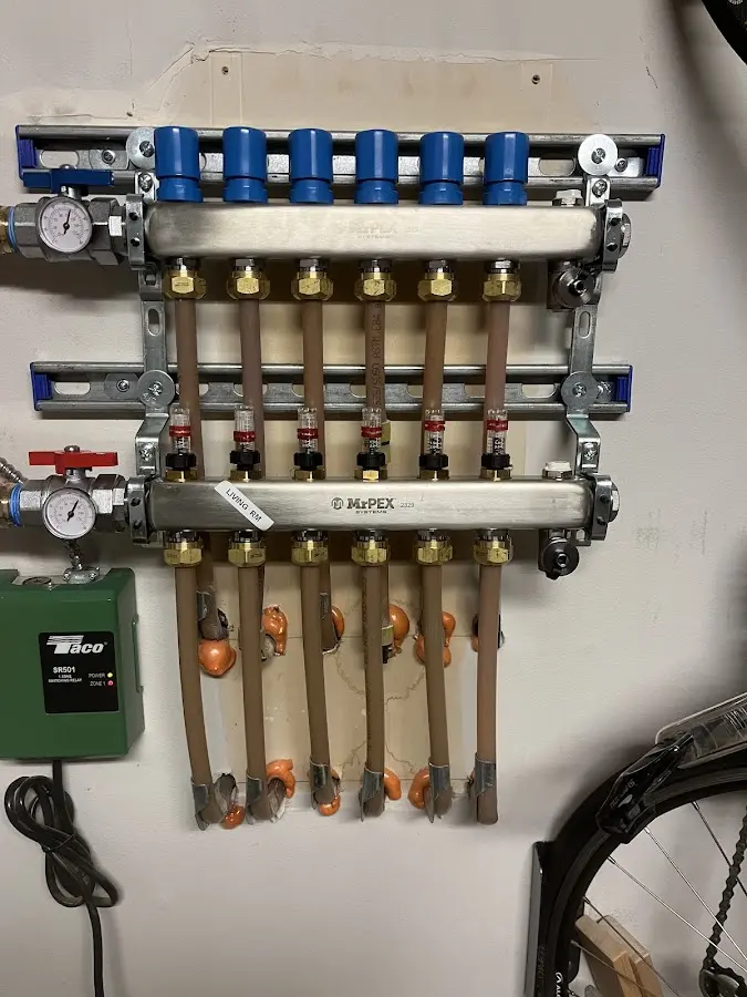 Plumber performing Leak Detection at a residential property in Grandville